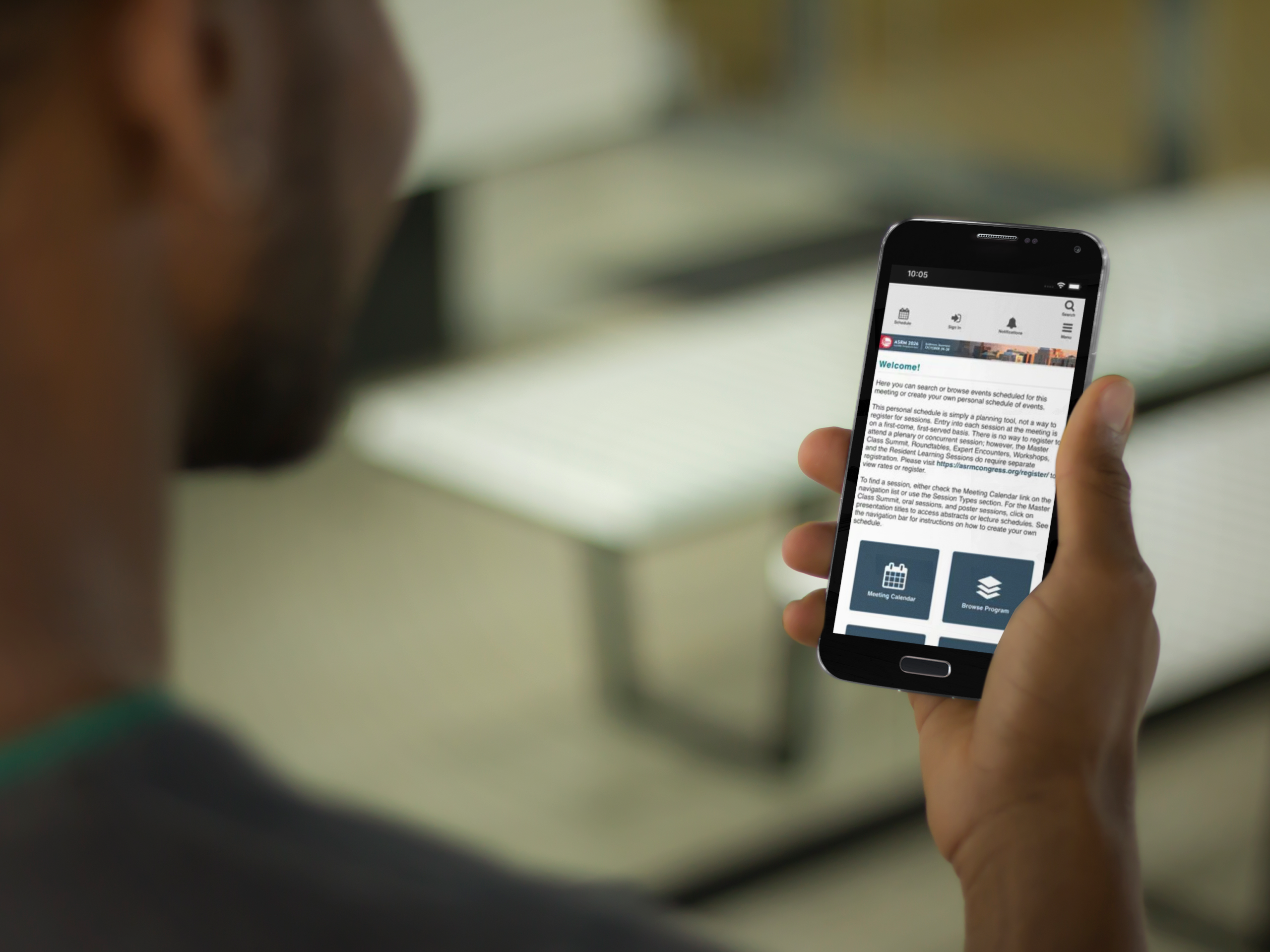Attendee viewing the ASRM 2026 Congress app on a smartphone